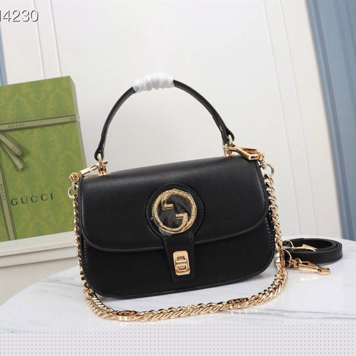 G*u*i top handle bags